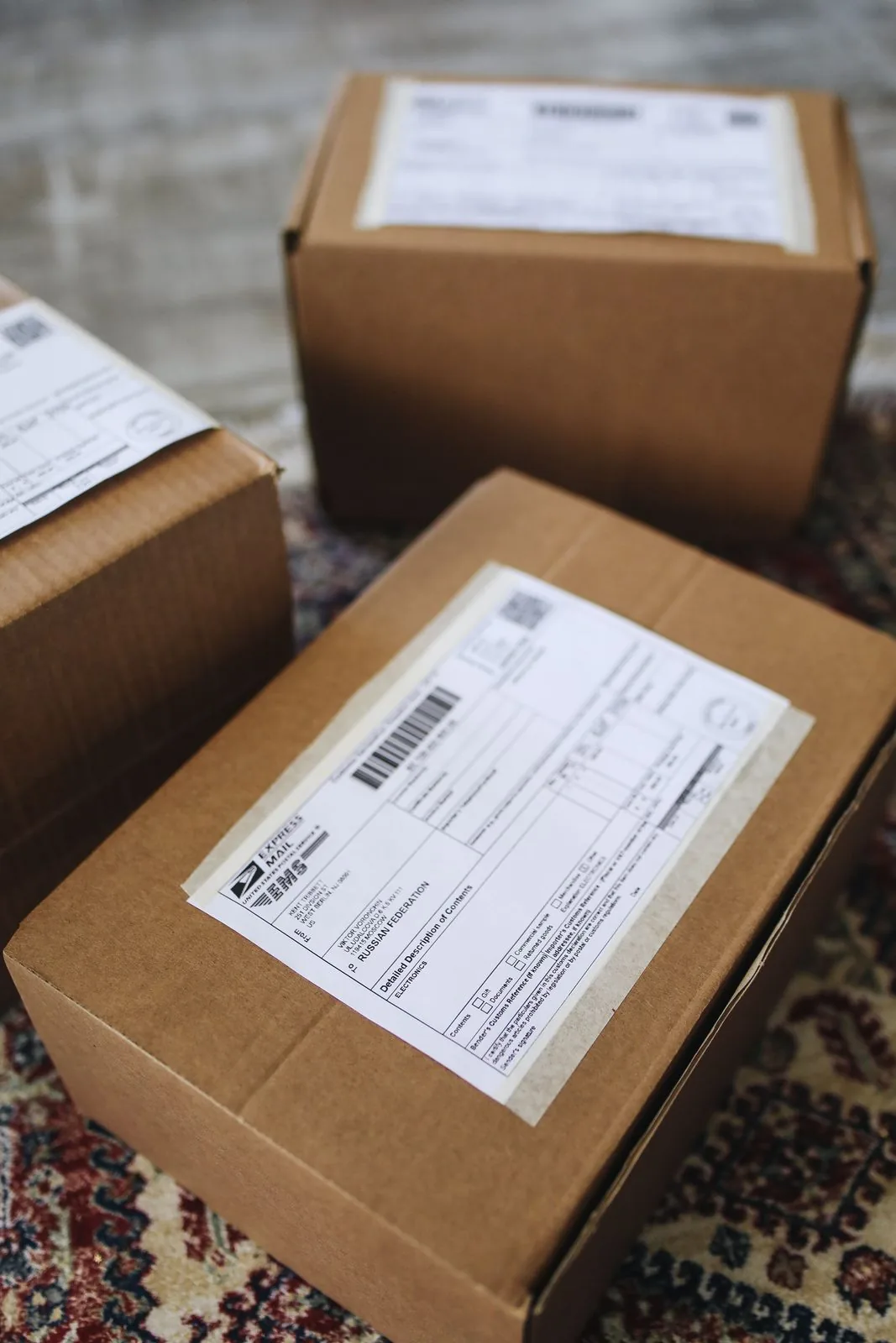Shipping labels with barcodes applied to cartons