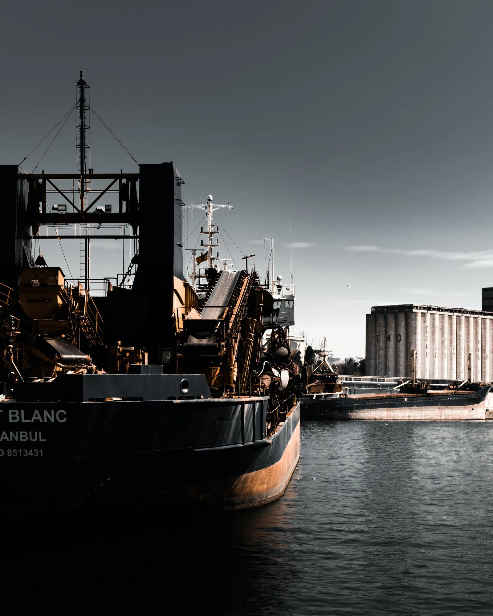 Cargo ship carrying containers across the ocean