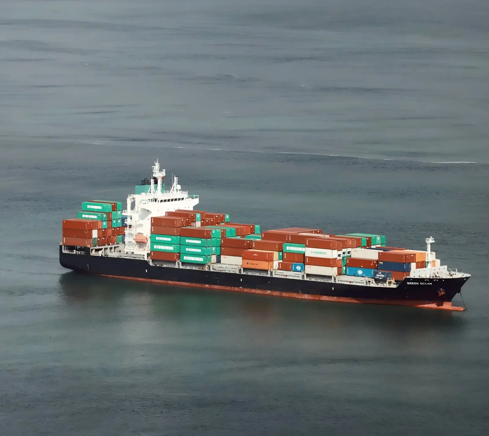 Container ship being loaded at a port terminal