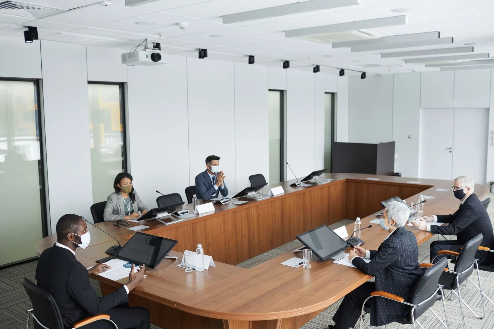 Buyer meeting a supplier at a factory negotiation table
