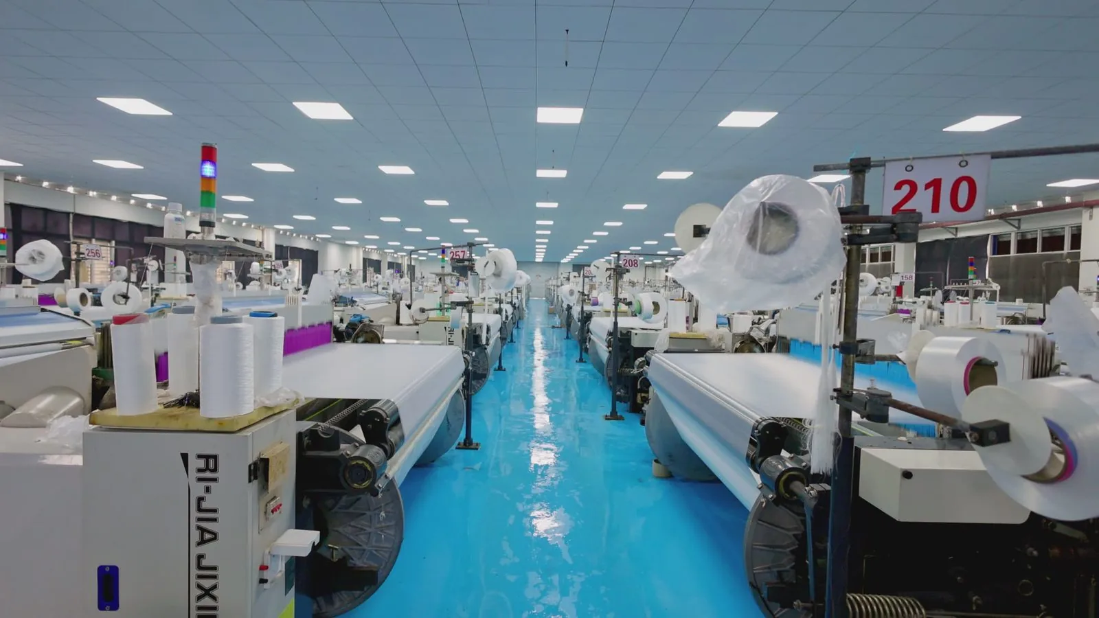 A production floor lined with machines ready for mass manufacturing