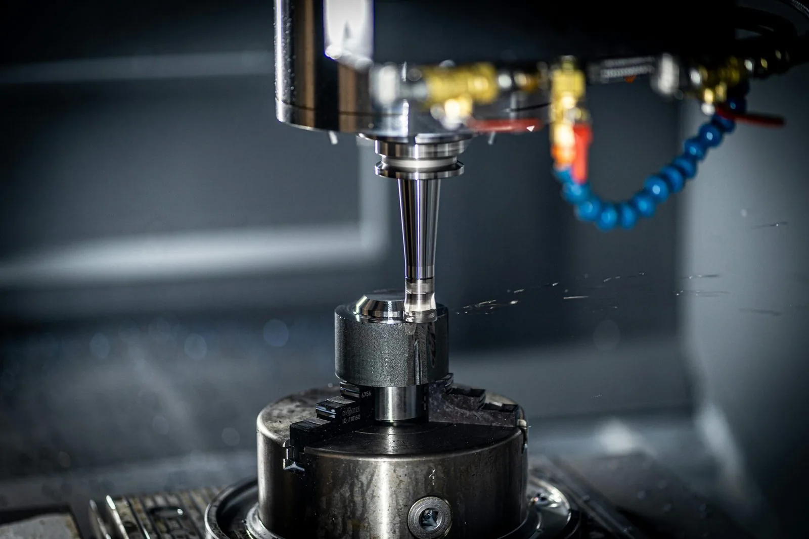 A precision cutting tool working a steel component
