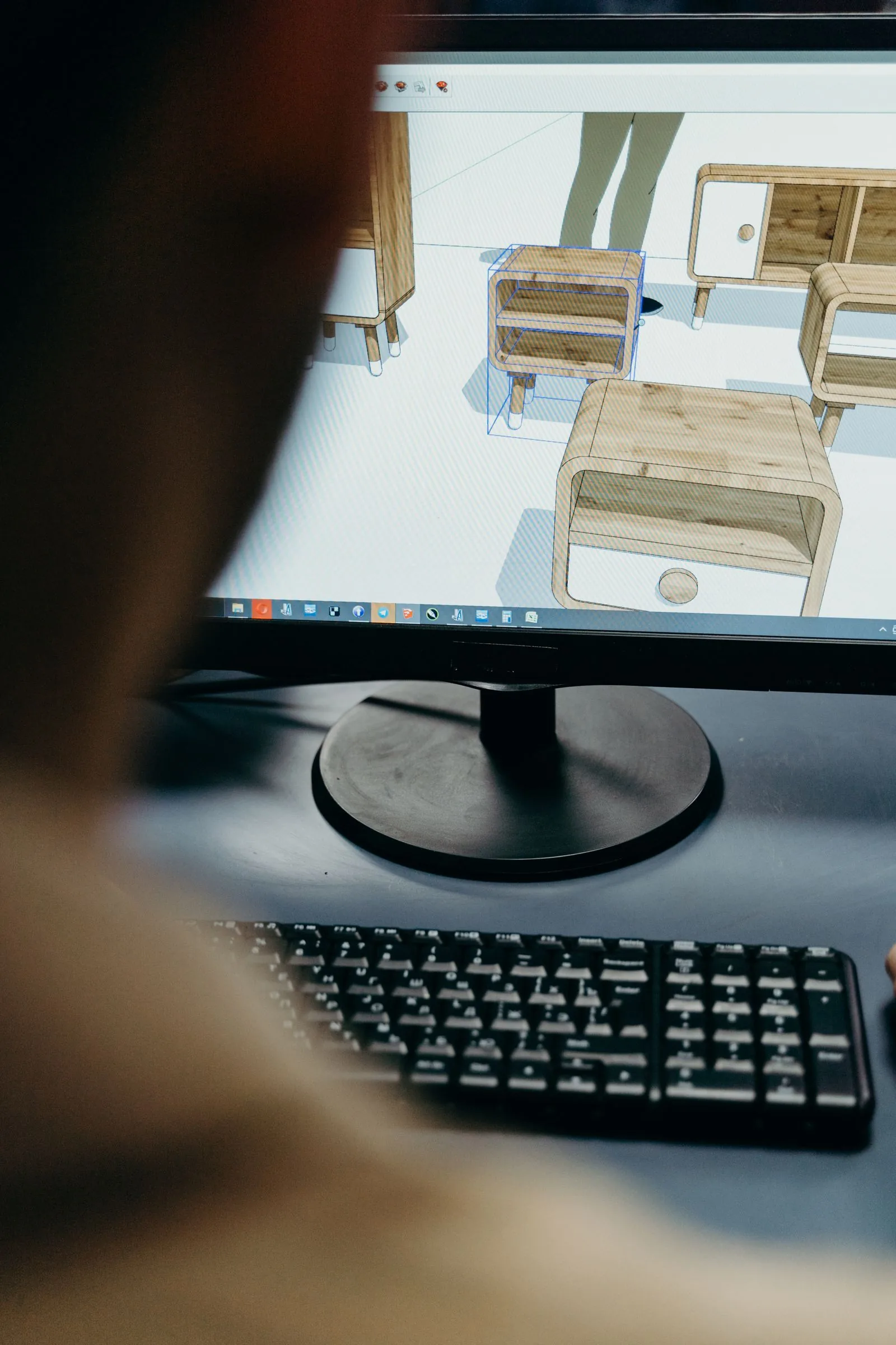 Brand owner reviewing product design at a desk